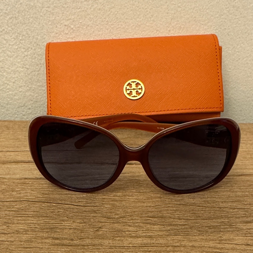 Tory Burch oversized sunglasses.